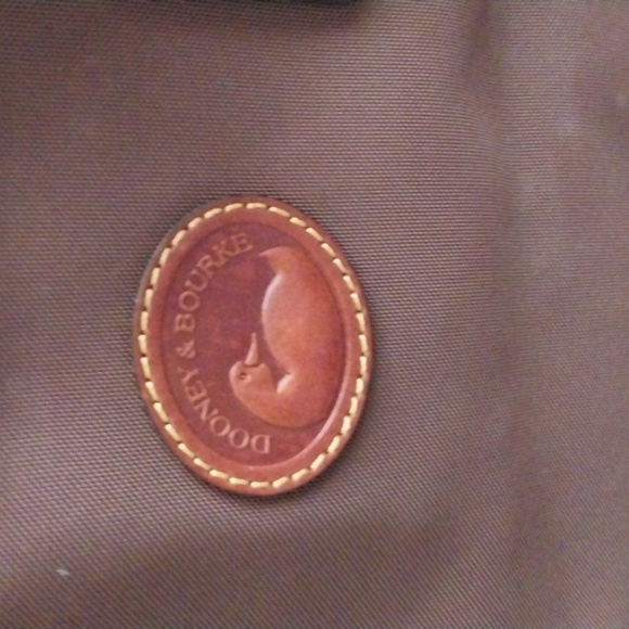 Dooney & Bourke medium satchel. Canvas w/leather trim. Key keeper. Used once. - Picture 2 of 6